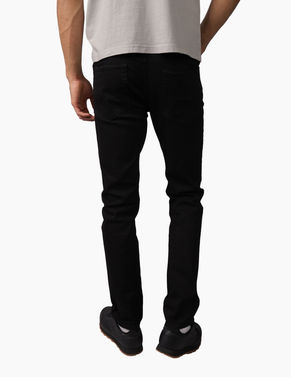 Jeans slim lavado obscuro para hombre